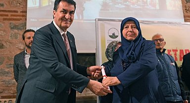 Bursa Osmangazi'nin örnek dönüşümünde tapular dağıtıldı