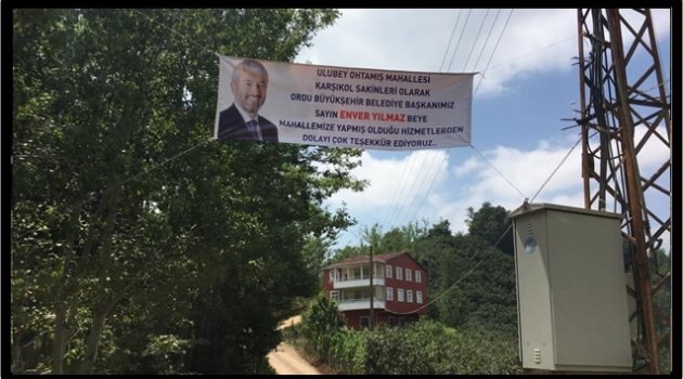 BAŞKAN YILMAZ&#039;A PANKARTLA TEŞEKKÜR ETTİLER