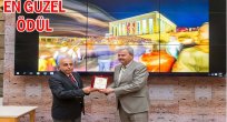 ÜNAL KALAFAT'A ANLAMLI ÖDÜL